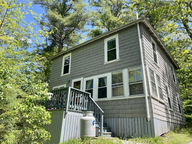 51 Rock Haven Dr, West Bath, ME 04530 - view of front facade with a wooden deck and stairs