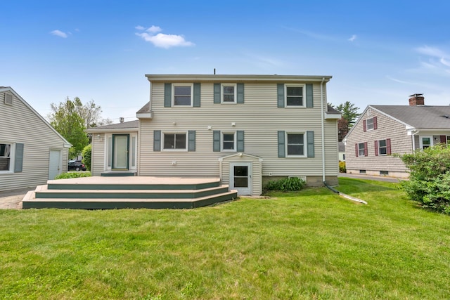 61 Carlyle Rd, Portland, ME 04103 - back of property with a yard and a wooden deck