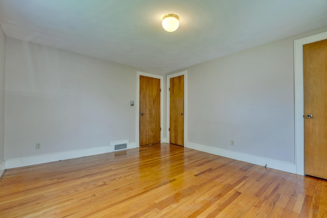 61 Carlyle Rd, Portland, ME 04103 - unfurnished room with light wood-style floors and baseboards