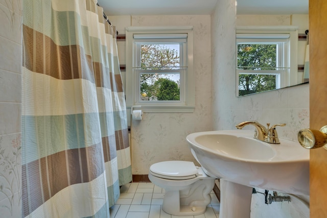 61 Carlyle Rd, Portland, ME 04103 - bathroom featuring toilet, tile patterned floors, and curtained shower