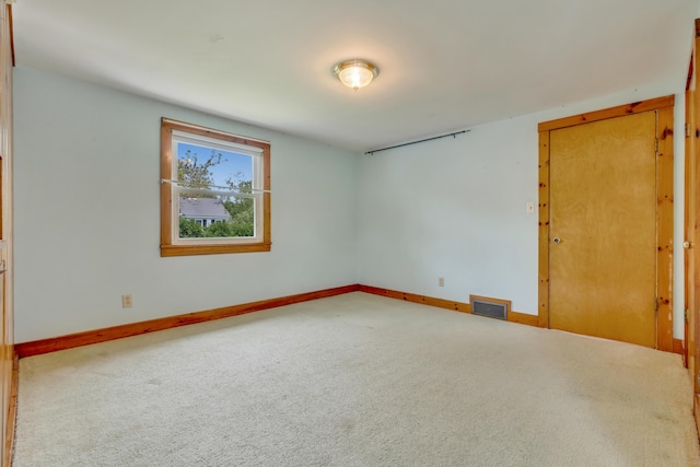 61 Carlyle Rd, Portland, ME 04103 - carpeted empty room with baseboards