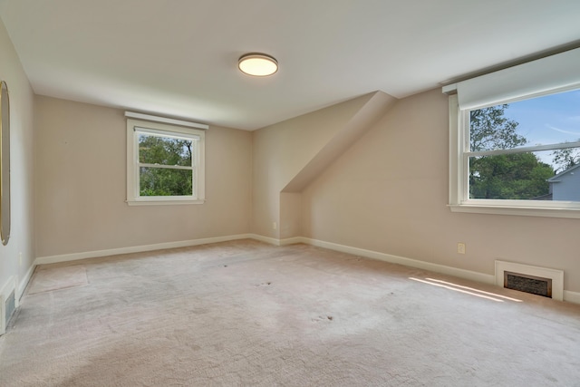 61 Carlyle Rd, Portland, ME 04103 - additional living space with carpet floors, baseboards, and a fireplace