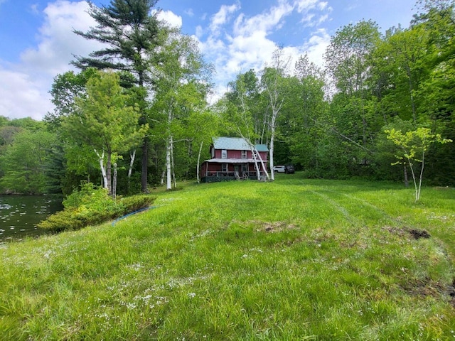 16 Mellen Ln, Wilton, ME 04294 - view of yard featuring a view of trees and a barn