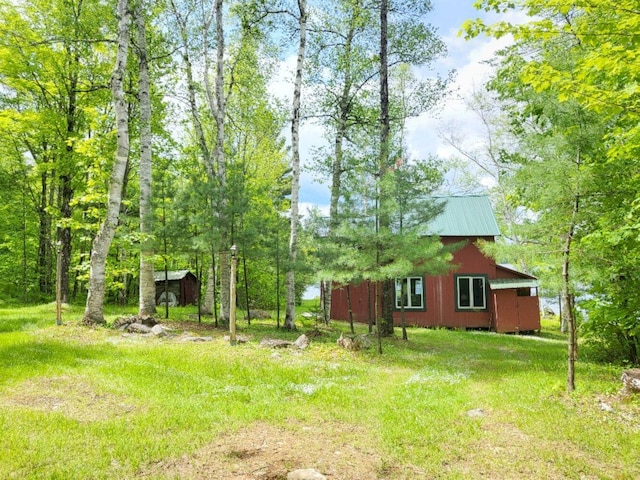 16 Mellen Ln, Wilton, ME 04294 - view of yard featuring an outdoor structure and a barn