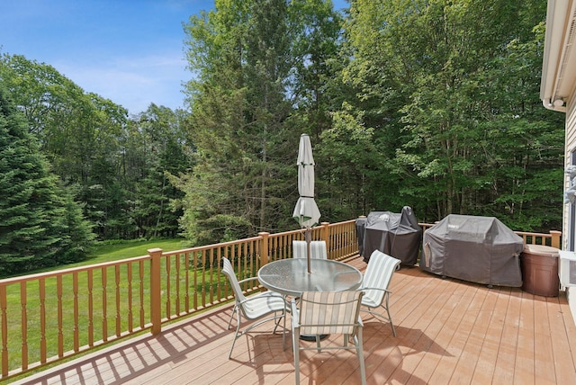 61 Crestview Ln, Brunswick, ME 04011 - wooden terrace with grilling area, outdoor dining area, and a yard
