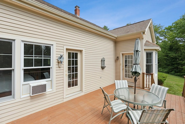 61 Crestview Ln, Brunswick, ME 04011 - wooden deck with outdoor dining area and cooling unit