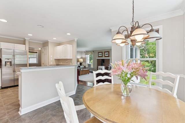 61 Crestview Ln, Brunswick, ME 04011 - dining space with ornamental molding, a chandelier, recessed lighting, and tile patterned floors