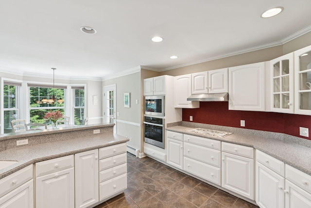 61 Crestview Ln, Brunswick, ME 04011 - kitchen with stainless steel appliances, under cabinet range hood, ornamental molding, white cabinetry, and a baseboard heating unit