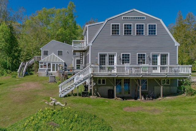 1241 Harpswell Islands Rd, Harpswell, ME 04079 - rear view of house with stairway, a wooden deck, and a yard