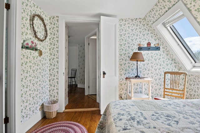 1241 Harpswell Islands Rd, Harpswell, ME 04079 - bedroom featuring wallpapered walls, hardwood / wood-style floors, baseboards, and a skylight