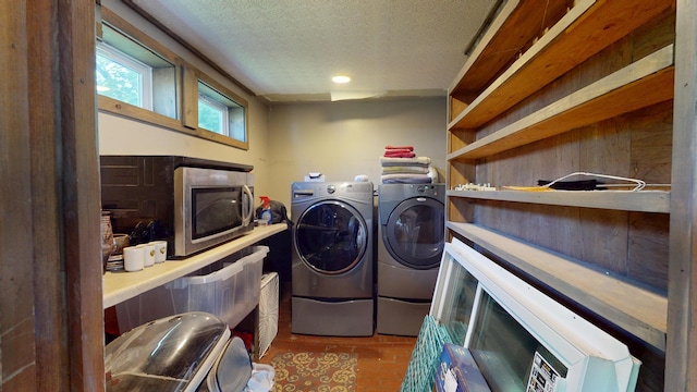 99 Kenduskeag Ave, Bangor, ME 04401 - laundry area with separate washer and dryer and a textured ceiling