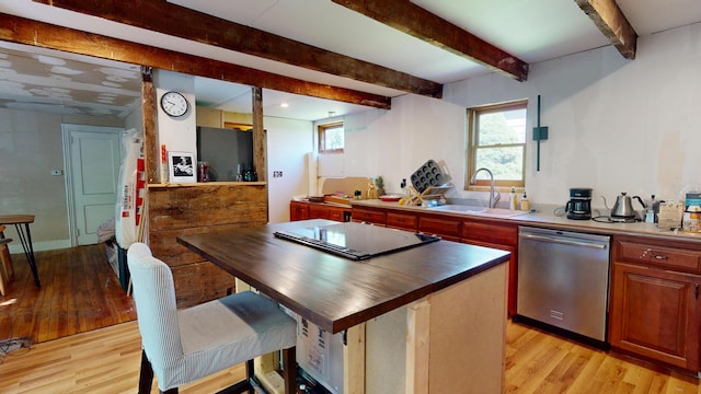 99 Kenduskeag Ave, Bangor, ME 04401 - kitchen with stainless steel dishwasher, black electric cooktop, light wood-type flooring, a sink, and beam ceiling