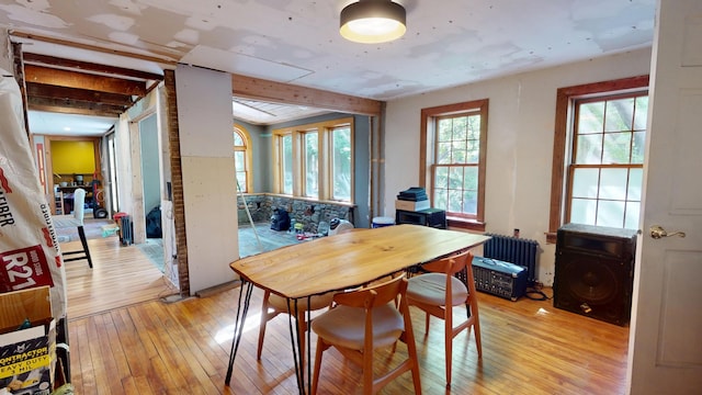 99 Kenduskeag Ave, Bangor, ME 04401 - dining area featuring radiator heating unit and light wood-style floors