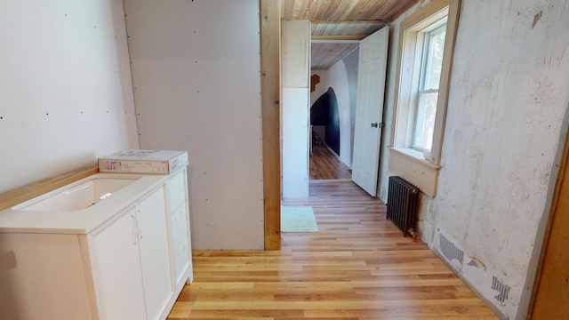 99 Kenduskeag Ave, Bangor, ME 04401 - hallway featuring radiator, light wood-style flooring, and wood ceiling