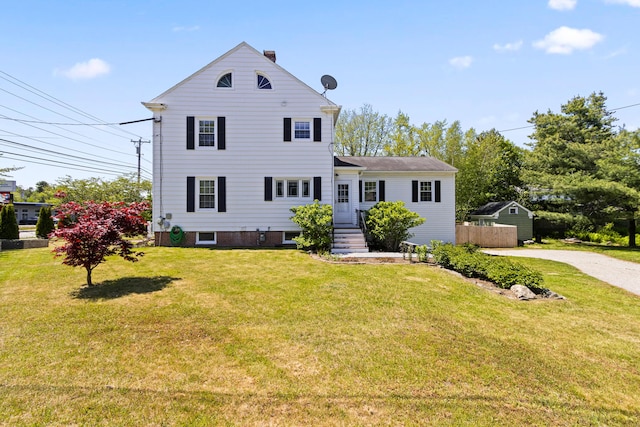 797 Main St, South Portland, ME 04106 - view of front of property with a front yard and a chimney