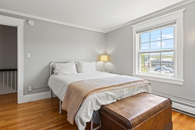 797 Main St, South Portland, ME 04106 - bedroom featuring hardwood / wood-style floors, crown molding, and baseboards