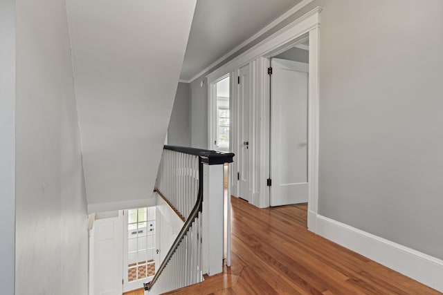 797 Main St, South Portland, ME 04106 - corridor with an upstairs landing, wood finished floors, baseboards, and healthy amount of natural light