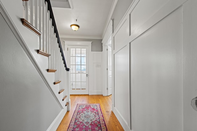 797 Main St, South Portland, ME 04106 - entryway with crown molding, light wood finished floors, and stairs