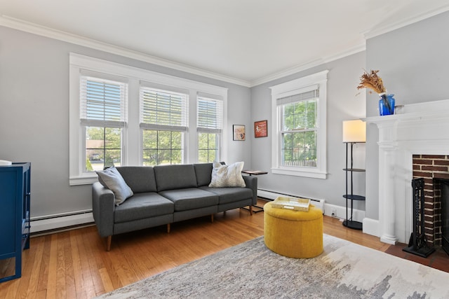 797 Main St, South Portland, ME 04106 - living area with a baseboard radiator, ornamental molding, hardwood / wood-style flooring, a fireplace with flush hearth, and baseboards