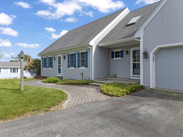 14 Merriconeag Ln, Harpswell, ME 04079 - view of front of house featuring roof with shingles and driveway