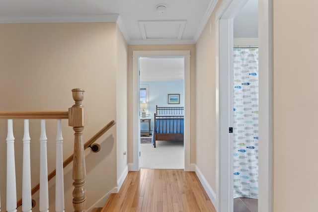 14 Merriconeag Ln, Harpswell, ME 04079 - corridor featuring an upstairs landing, light wood finished floors, ornamental molding, and baseboards
