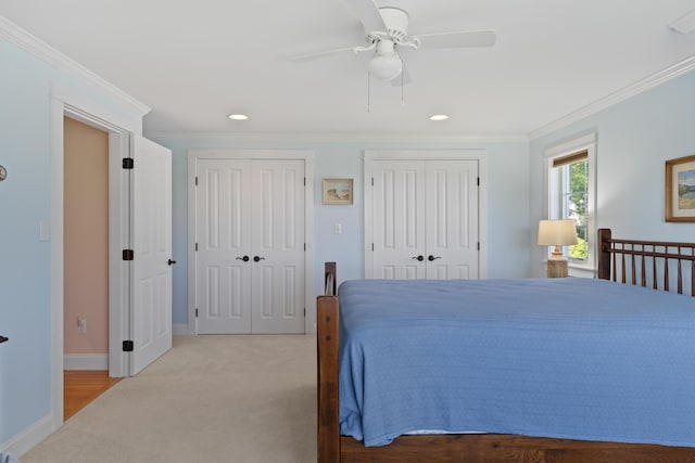 14 Merriconeag Ln, Harpswell, ME 04079 - carpeted bedroom with multiple closets, ornamental molding, baseboards, recessed lighting, and a ceiling fan
