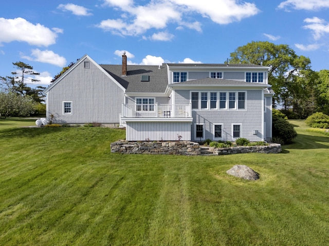 14 Merriconeag Ln, Harpswell, ME 04079 - rear view of property featuring a lawn, a chimney, and roof with shingles