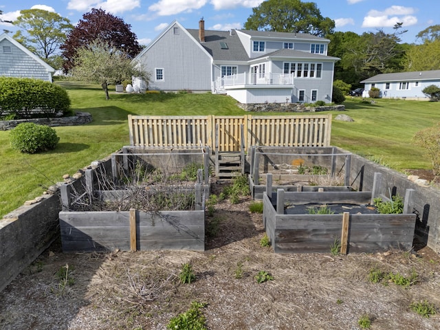 14 Merriconeag Ln, Harpswell, ME 04079 - rear view of house with a garden and a yard