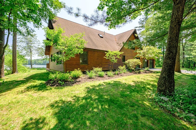 147 Sand Bar Rd, Windham, ME 04062 - view of side of property featuring roof with shingles and a lawn