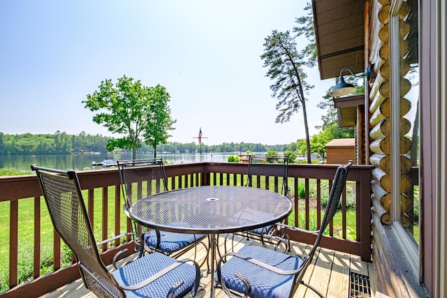 147 Sand Bar Rd, Windham, ME 04062 - wooden terrace with a water view, outdoor dining space, and a yard