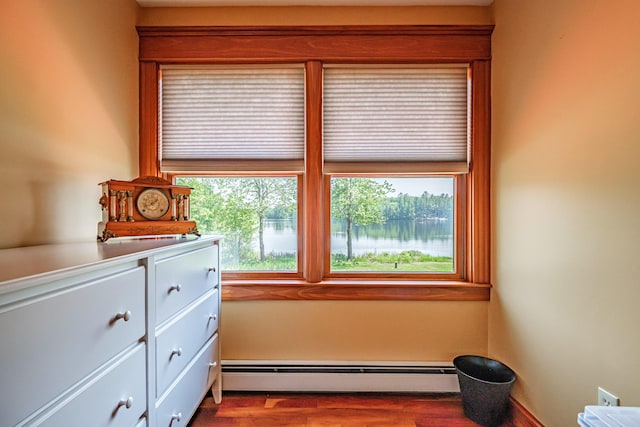 147 Sand Bar Rd, Windham, ME 04062 - sitting room featuring a baseboard heating unit and wood finished floors