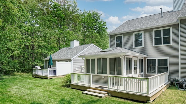 17 Cammock Rd Unit 17, Scarborough, ME 04074 - back of house with a sunroom, a deck, and a yard