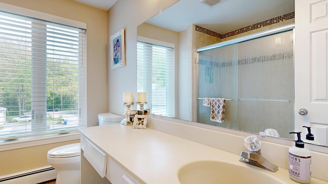 17 Cammock Rd Unit 17, Scarborough, ME 04074 - bathroom featuring baseboard heating, toilet, tiled shower, and vanity
