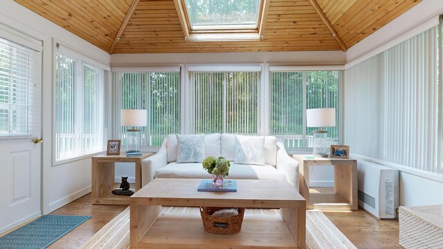 17 Cammock Rd Unit 17, Scarborough, ME 04074 - sunroom with wood ceiling, plenty of natural light, vaulted ceiling, wood finished floors, and baseboards