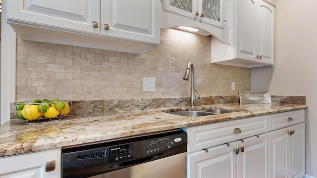 17 Cammock Rd Unit 17, Scarborough, ME 04074 - kitchen with dishwasher, a sink, white cabinetry, and tasteful backsplash