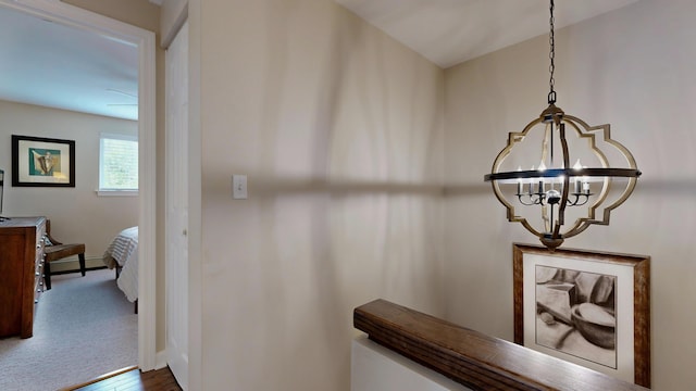 17 Cammock Rd Unit 17, Scarborough, ME 04074 - hall featuring a chandelier, dark wood finished floors, and baseboards