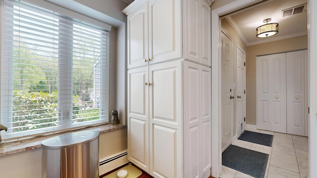17 Cammock Rd Unit 17, Scarborough, ME 04074 - entryway featuring baseboard heating and crown molding