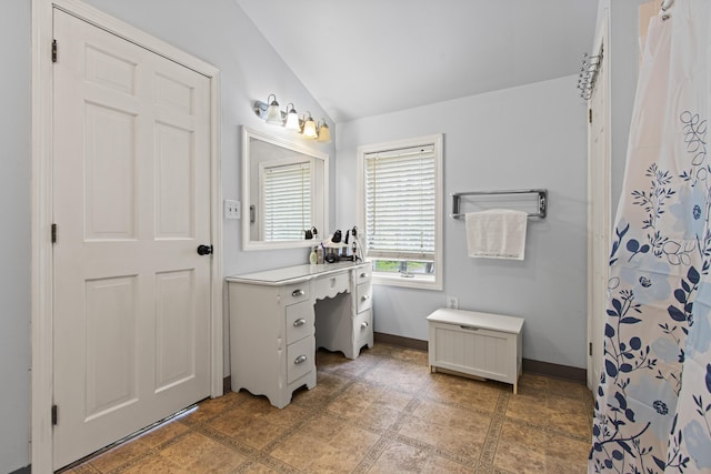 463 Brook St, Westbrook, ME 04092 - bathroom with vanity, lofted ceiling, baseboards, and a shower with shower curtain