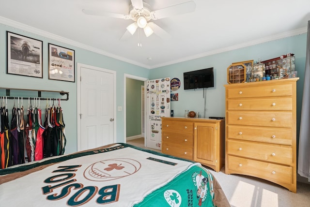 26 Serenity Ln, Topsham, ME 04086 - carpeted bedroom featuring crown molding, a ceiling fan, a closet, and baseboards