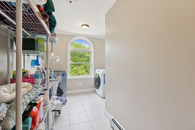 26 Serenity Ln, Topsham, ME 04086 - laundry area with washer / clothes dryer, ornamental molding, baseboards, and light tile patterned flooring