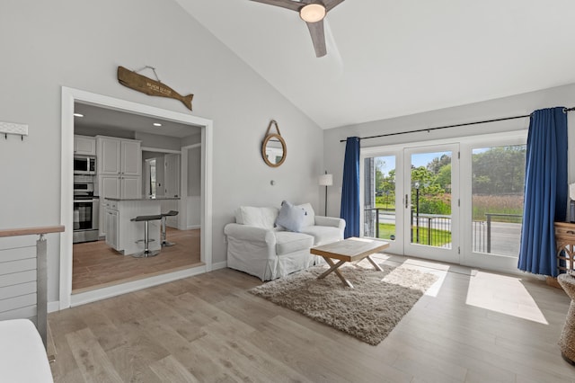 27 Seaside Ave, Saco, ME 04072 - living room featuring high vaulted ceiling, light wood-type flooring, and a ceiling fan