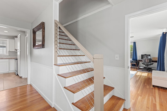 27 Seaside Ave, Saco, ME 04072 - stairs with wood finished floors and wainscoting