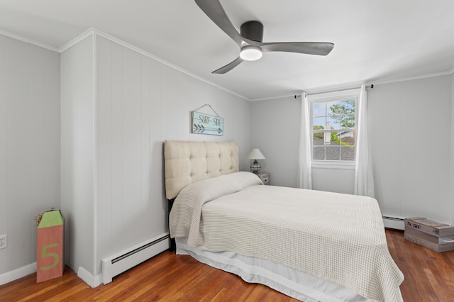 27 Seaside Ave, Saco, ME 04072 - bedroom with a baseboard radiator, wood finished floors, ceiling fan, and ornamental molding