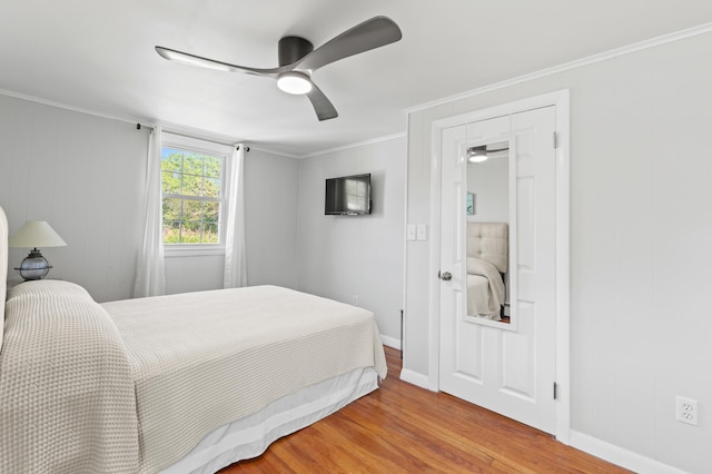 27 Seaside Ave, Saco, ME 04072 - bedroom featuring wood finished floors, ceiling fan, and ornamental molding