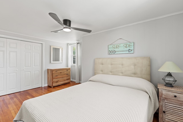 27 Seaside Ave, Saco, ME 04072 - bedroom featuring a closet, wood finished floors, a ceiling fan, and crown molding