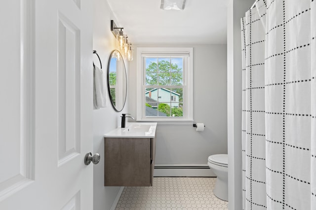 27 Seaside Ave, Saco, ME 04072 - bathroom with a baseboard radiator, vanity, and a shower with curtain