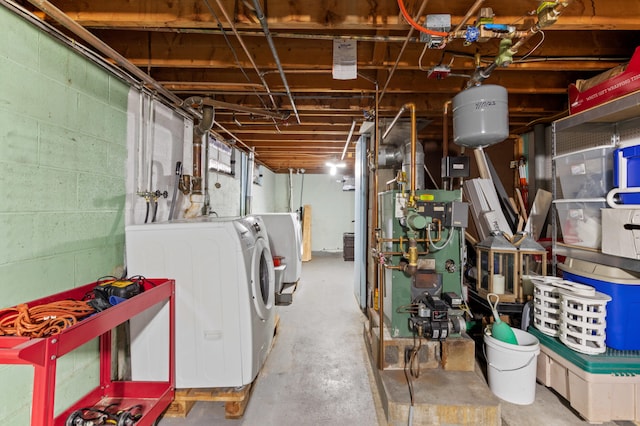27 Seaside Ave, Saco, ME 04072 - unfinished below grade area featuring independent washer and dryer and a heating unit