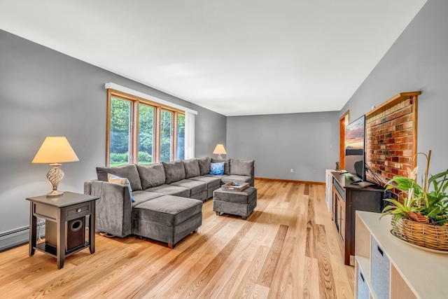 60 Evergreen Dr, Hermon, ME 04401 - living area featuring light wood-style floors and a baseboard radiator