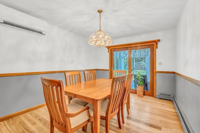 60 Evergreen Dr, Hermon, ME 04401 - dining area with a wall mounted air conditioner, a baseboard heating unit, light wood-type flooring, and a chandelier