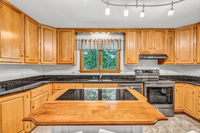 60 Evergreen Dr, Hermon, ME 04401 - kitchen with stainless steel appliances, under cabinet range hood, and butcher block countertops